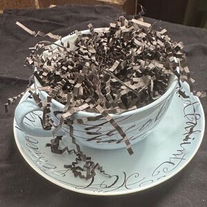 Elegant Scripted Teacup and Saucer Set by Rosanna.